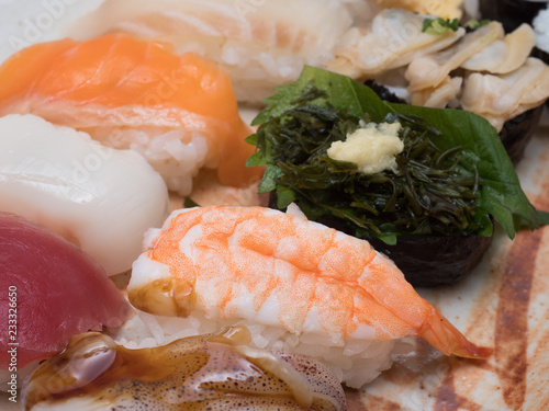 Fototapeta Naklejka Na Ścianę i Meble -  Japanese hand-held sushi