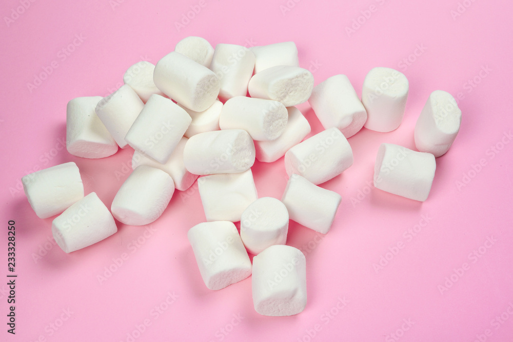 Marshmallows on pink background Marshmallows on pink background