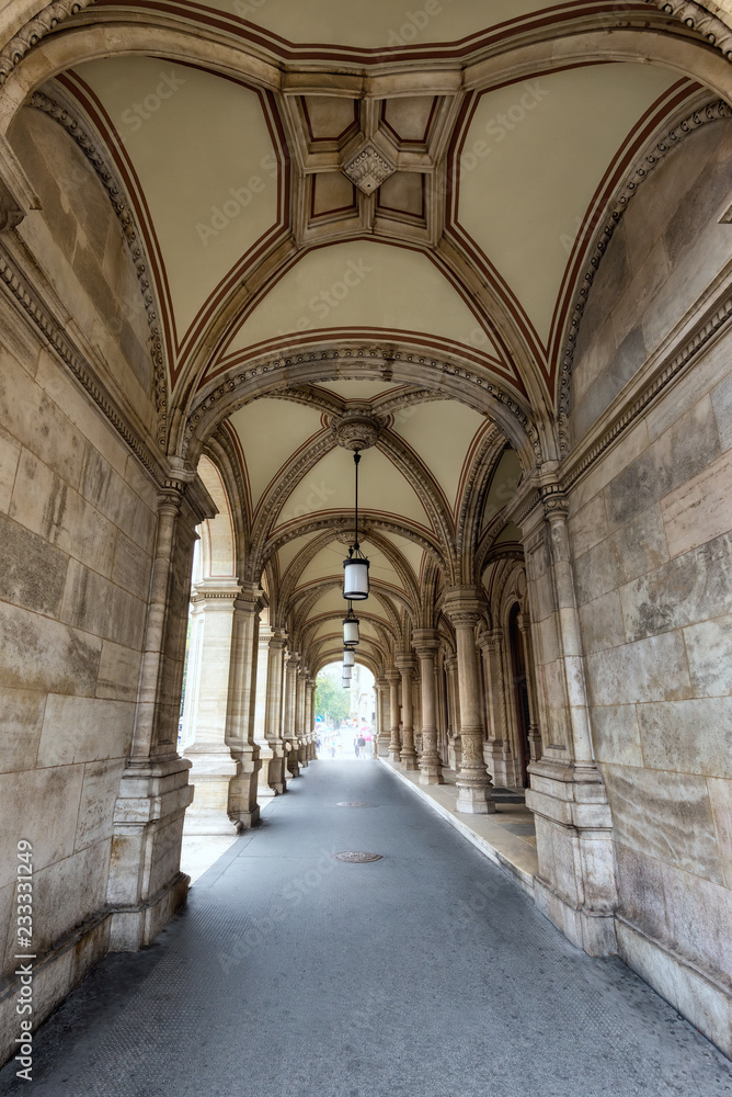 Archway in Vienna / Scenic view of a beautiful arcade with vaulted ceilings in a public building in Vienna, Austria.