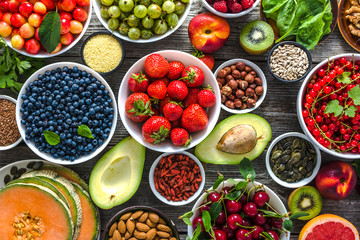 Healthy food background. Table with breakfast in a bowls, superfood, health vegetarian nutrition, antioxidant fruits and vegetables