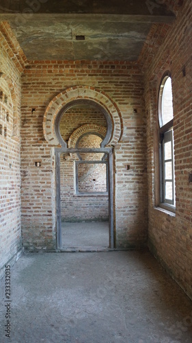 Corridor of abandoned bricks mansion in Perak