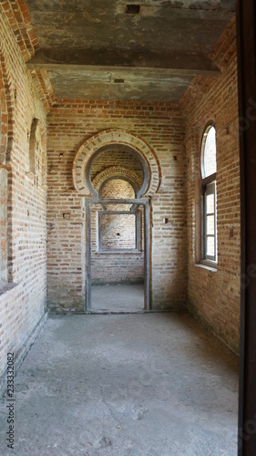 Corridor of abandoned bricks mansion in Perak