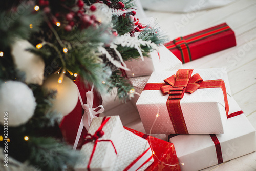 Christmas presents under Christmas tree.