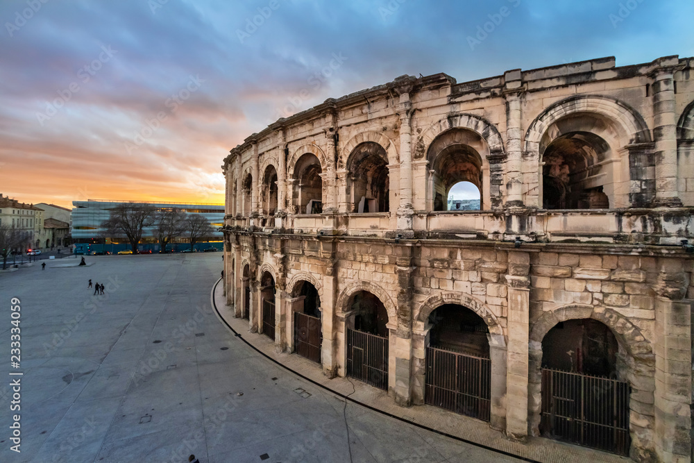 Nimes, France. High angle view of Roman amphitheater (Arena of Nimes) at dusk