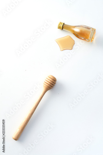 Honey dipper and honey bottle