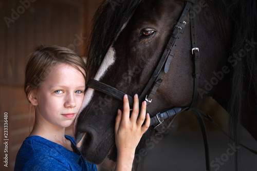 Girl with black horse