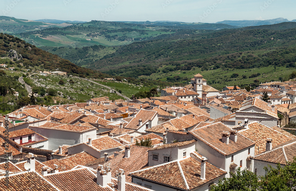 White houses of Grazalema surrounded by mountains in Spain