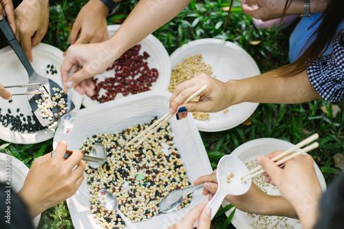 Group of hands Christian people helping seed selection,harmonious concept
