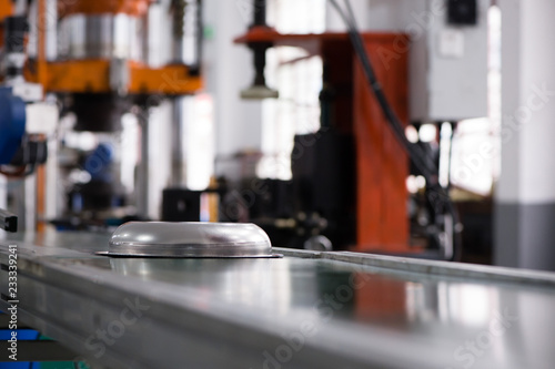 Stainless steel metal bowl manufacturing plant detail shot assembly line production