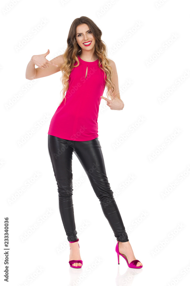 Beautiful Woman Is Pointing At Herself, Smiling And Looking At Camera Beautiful Woman Is Pointing At Herself, Smiling And Looking At Camera