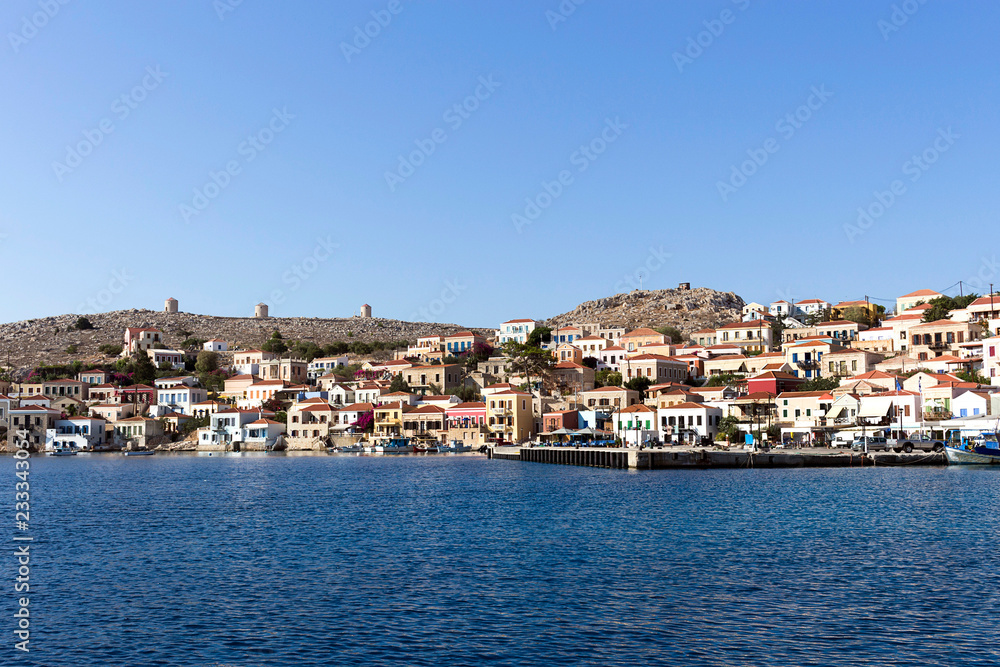 The seafront of Emporio, Chalki, Halki island. Aegean sea, Dodecanese Islands, Greece
