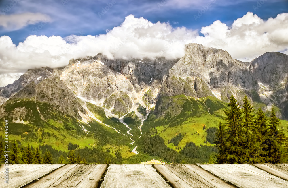 Wooden empty table and mountains landscape background
