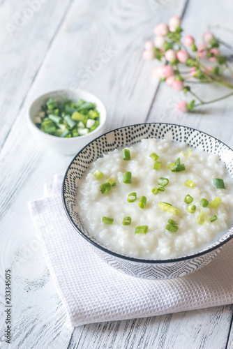 Bowl of congee - Asian rice porridge photo