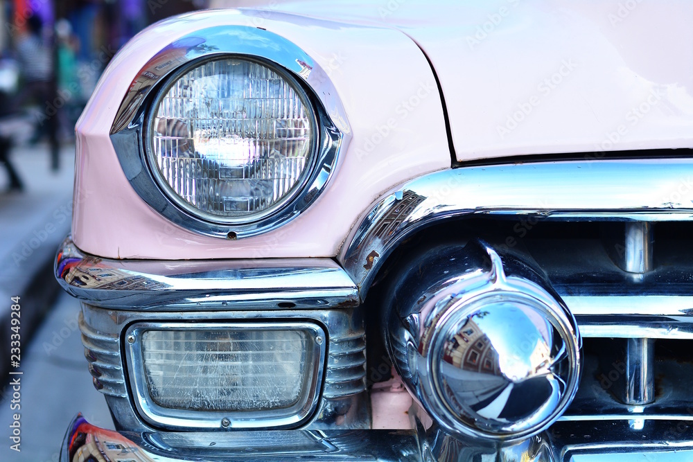 Headlight of a luxury American vintage vehicle