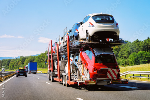 Cars carrier truck at asphalt highway road of Poland © Roman Babakin