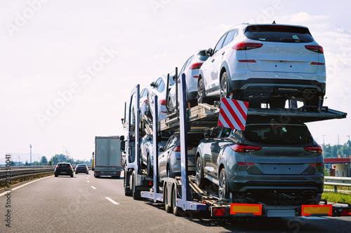 Cars carrier truck in asphalt highway road of Poland