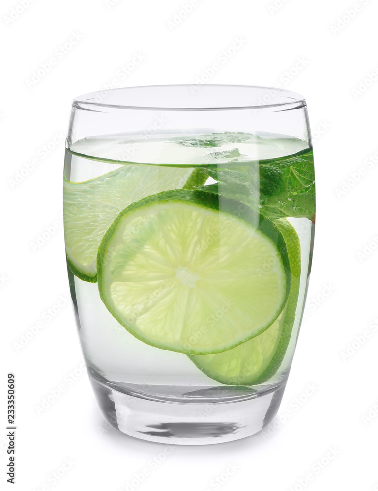 Glass of water with lime and mint on white background Glass of water with lime and mint on white background