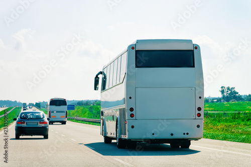 White Tourist bus on highway road Poland © Roman Babakin