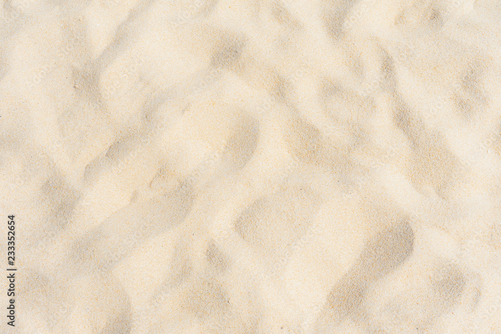 Fine beach sand in the summer sun Fine beach sand in the summer sun