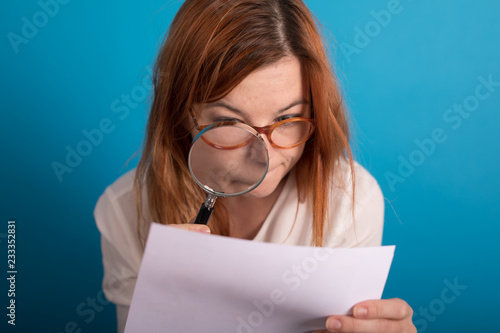 young girl controling paper...