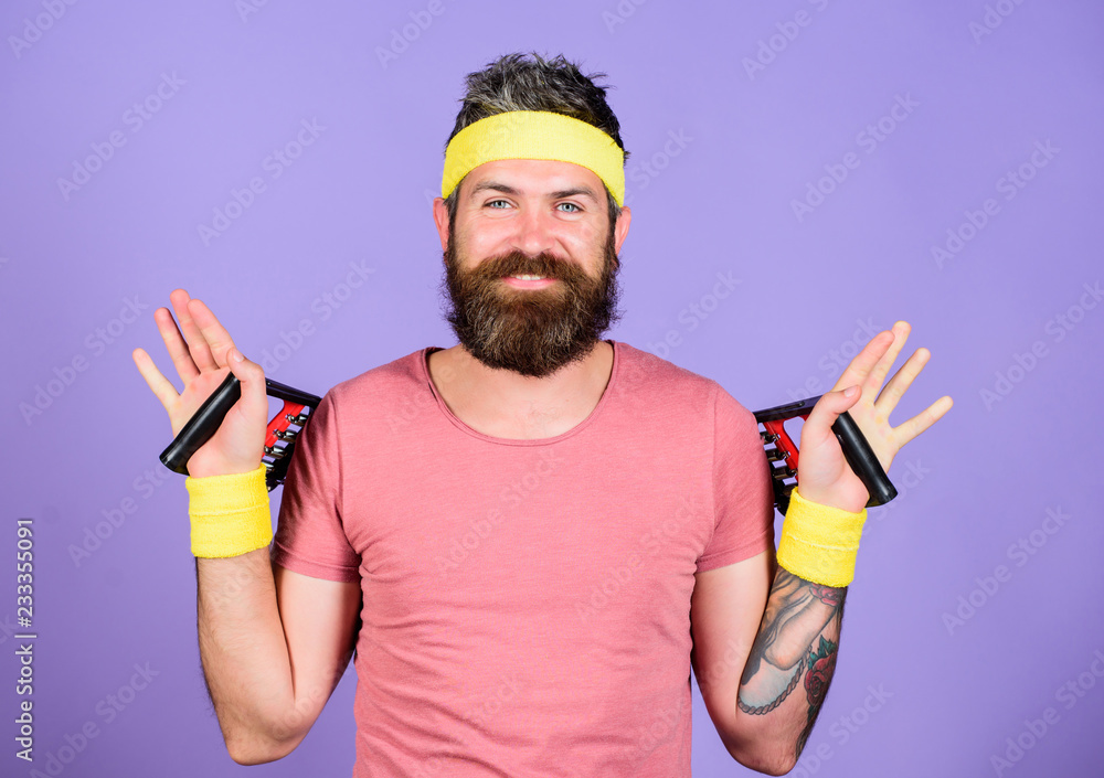 Join my sport class. Sportsman wear retro outfit training violet background. Athlete sport instructor. Athlete training with chest expander. Man bearded athlete exercising with expander equipment Join my sport class. Sportsman wear retro outfit training violet background. Athlete sport instructor. Athlete training with chest expander. Man bearded athlete exercising with expander equipment