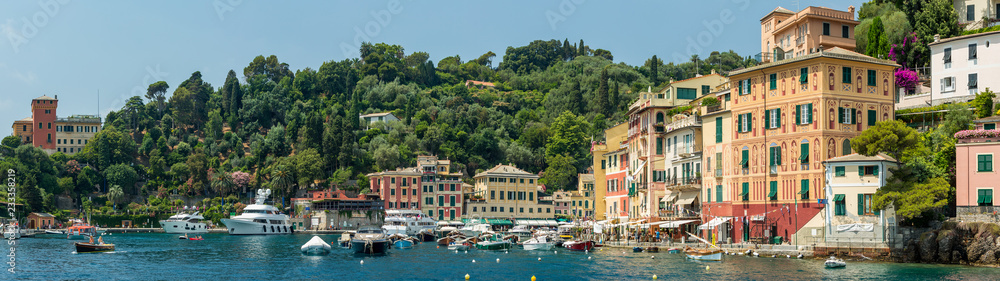 Panoramic view of the buildings overlooking the beautiful harbour at Portofino on the  Ligurian coast, Italy