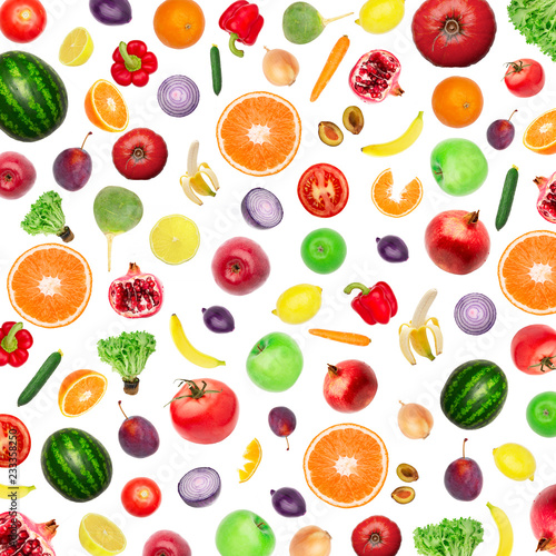 Pattern of vegetables and fruits. Food background Top view Composition of plums, peppers, cucumbers, green radish, tomatoes, apples, banana, lemon and orange, watermelon, pomegranate isolated on white
