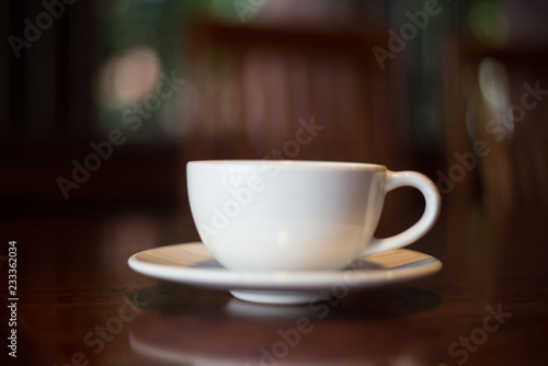 Coffee cup on blur background.
