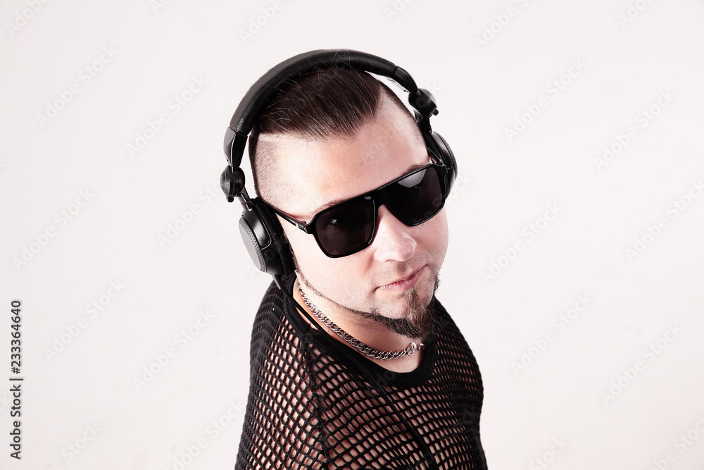 view from the top.close up.cool male rapper with black glasses. view from the top.close up.cool male rapper with black glasses.