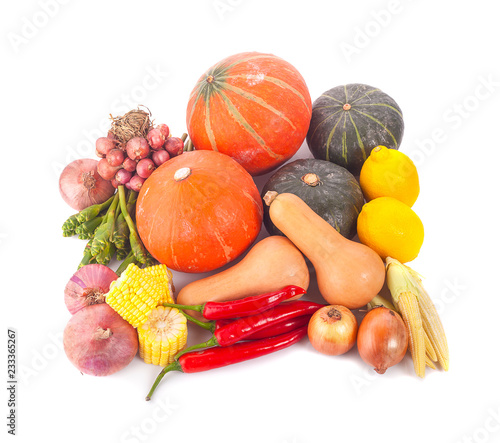 Heap of fresh vegetables isolated on white