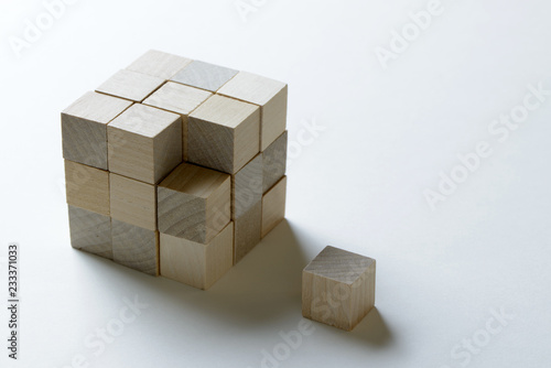 Фотография Last missing piece wood cube to complete a bigger block