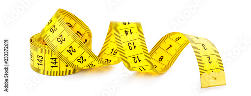 Yellow measuring tape isolated on white background