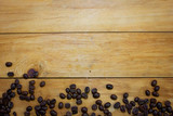 Coffee bean on wooden background.