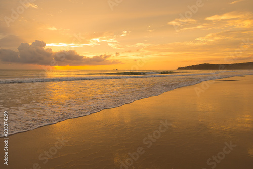 Golden sunset on the beach  © antonburkhan