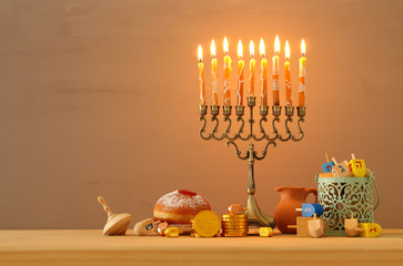 image of jewish holiday Hanukkah background with menorah (traditional candelabra).