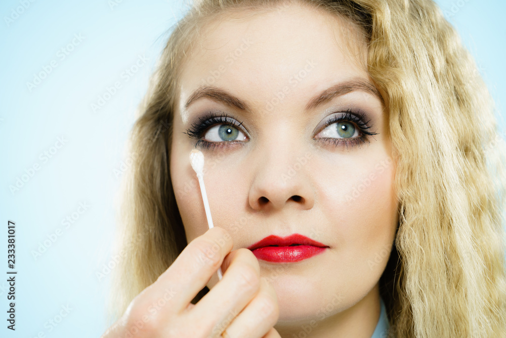 Professional artist fixing fashion model make up Professional artist fixing fashion model make up