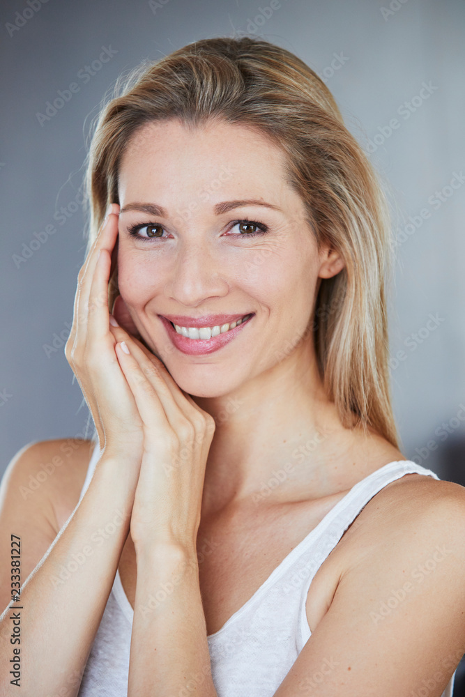 Portrait of smiling blond woman in the morning Portrait of smiling blond woman in the morning