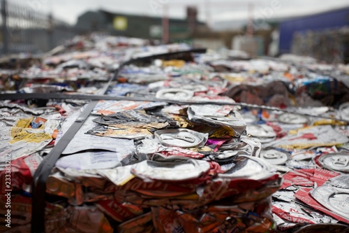 Flattened cans in a recycling centre in the UK