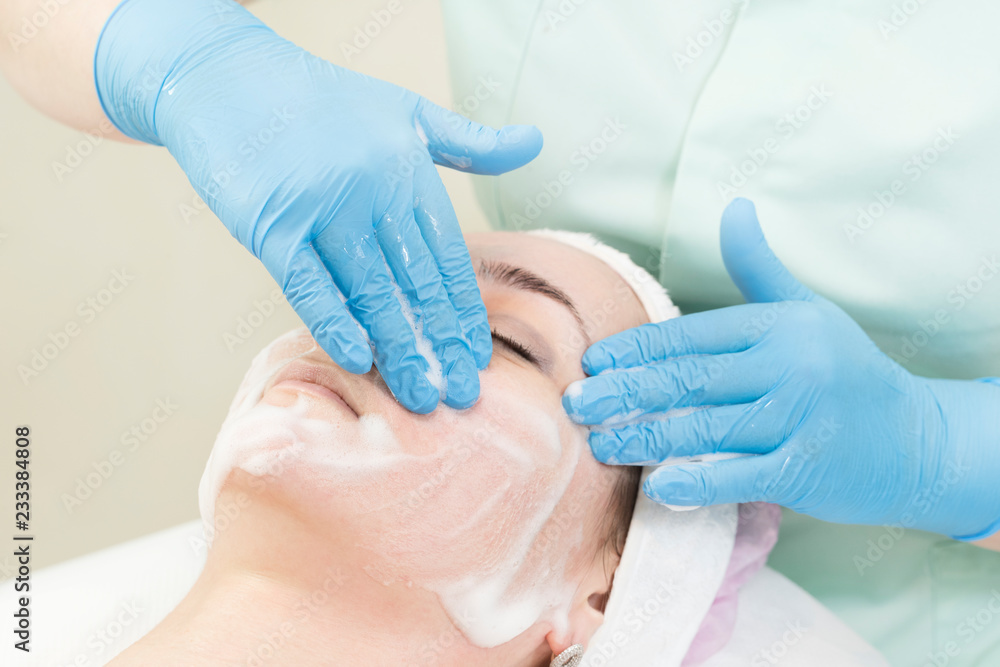 Process cosmetic mask of massage and facials in beauty salon Process cosmetic mask of massage and facials in beauty salon