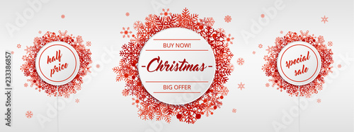 Christmas sales with red snowflakes on white background 