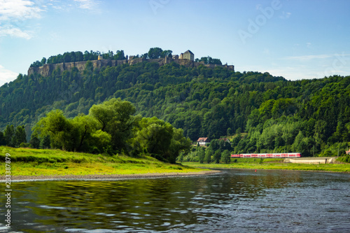 Beautiful view on Königstein castle from river Elbe in Saxony, Germany