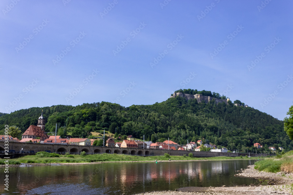 Beautiful view on Königstein castle from river Elbe in Saxony, Germany