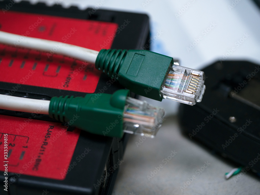 UTP ethernet cables.close up macro shot with tools and cables background. UTP ethernet cables.close up macro shot with tools and cables background.