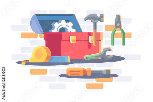 Toolkit with repair equipment, gear wheel, roller, hammer. © Nataliya Kalabina