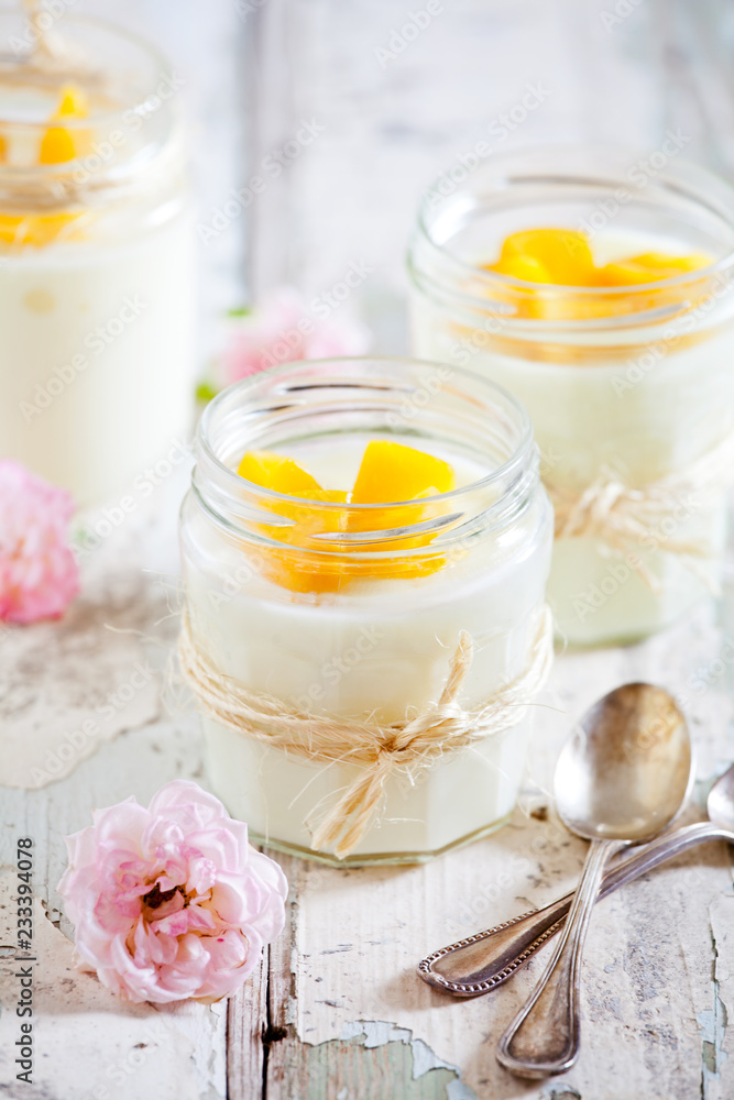 Vanilla Pudding With Mango In Small Jars Vanilla Pudding With Mango In Small Jars
