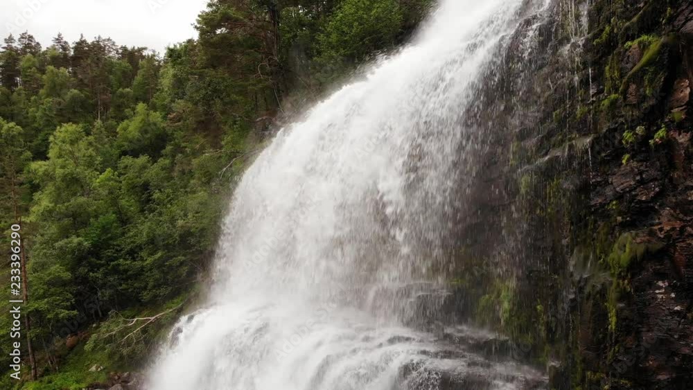 Svandalsfossen in Norway, waterfall in norwegian mountains. National tourist Ryfylke route Svandalsfossen in Norway, waterfall in norwegian mountains. National tourist Ryfylke route