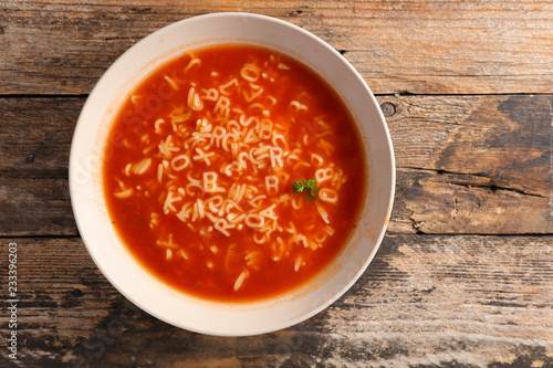 Photos bowl of soup and alphabet noodles