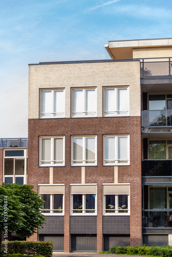 Clear sunny day at a building apartment house Clear sunny day at a building apartment house