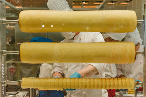 Cake making. Baumkuchen