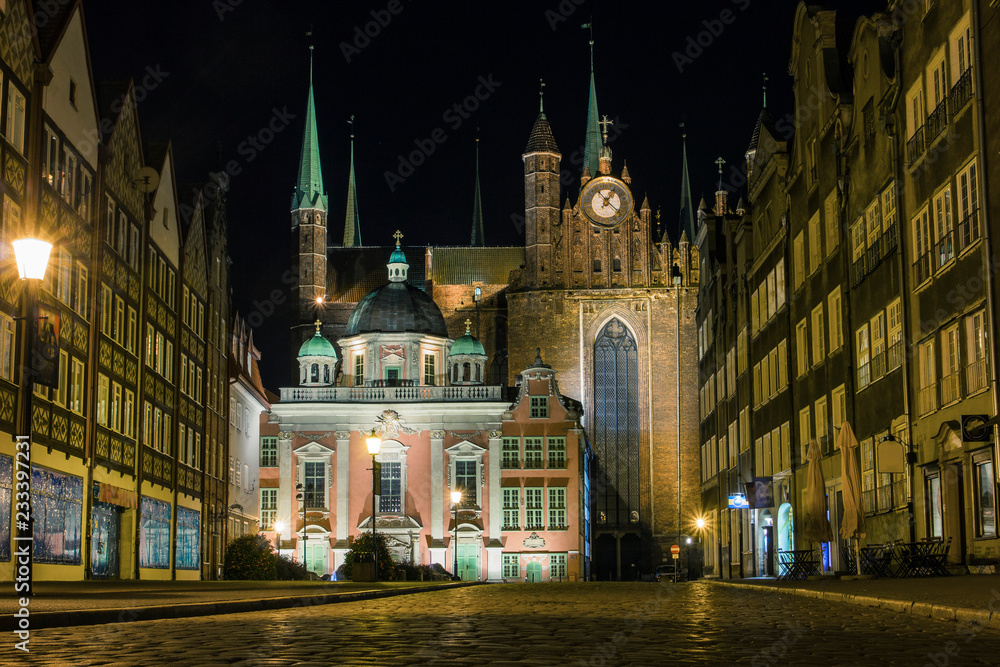 St. Mary's Church and King's Chapel in the Old Town in Gdansk at night. Poland